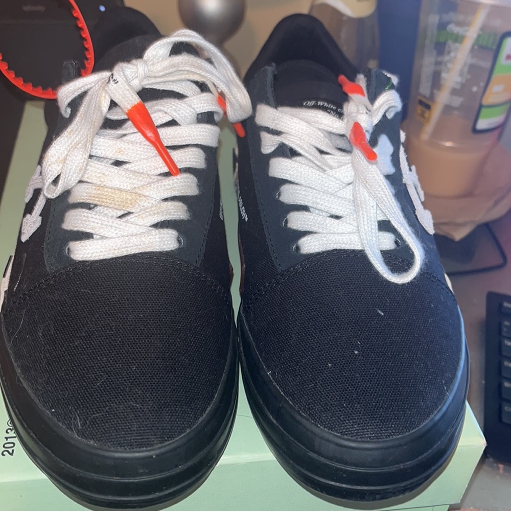 Black and white off white low top